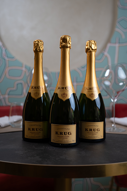 Tre bottiglie di Champagne Krug Grande Cuvée 23ª Édition sul tavolo del ristorante Da Sacerno